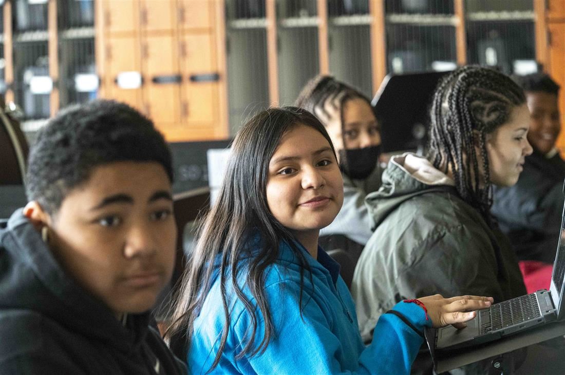 Students in class with laptops